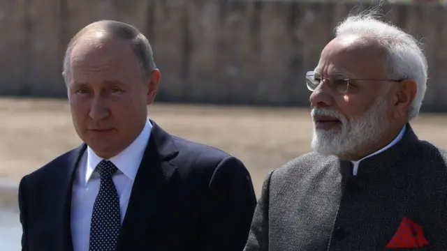 મોદી અને પુતીનની તસવીર