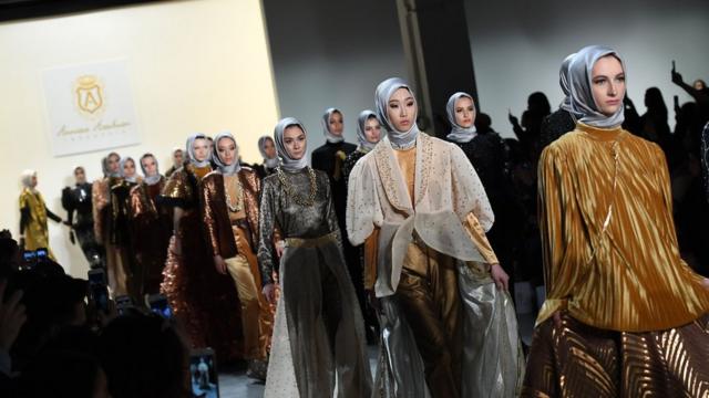 Models walk the runway for the Anniesa Hasibuan show during New York Fashion Week on February 14, 2017