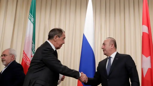 Los ministros de relaciones exteriores de Rusia, Turquía e Irán después de una reunión el 20 de diciembre de 2016
