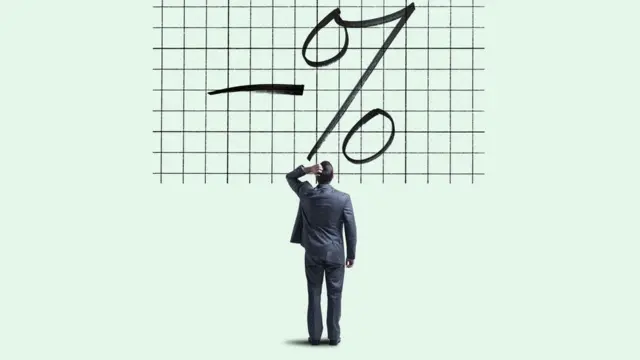 Čovek zbunjen oznakom za procente