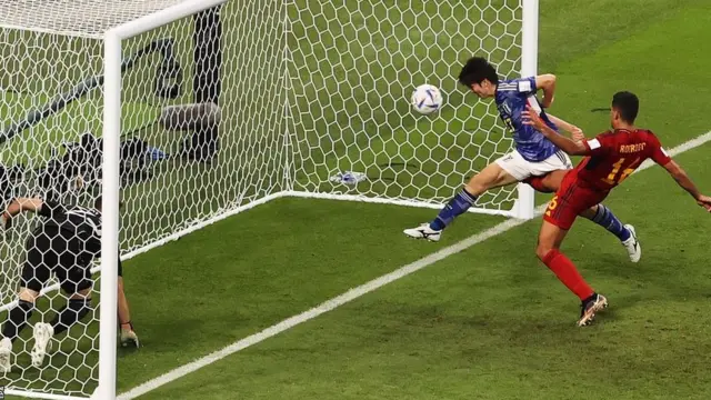 Kaoru Mitoma scores Japan's second goal against Spain