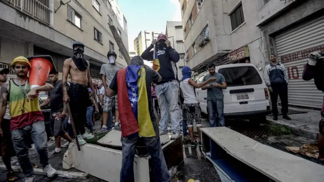 Manifestantes en Caracas contra el gobierno de Nicolás Maduro.
