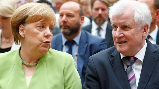 Меркель и Зеехофер, июнь 2018 г
