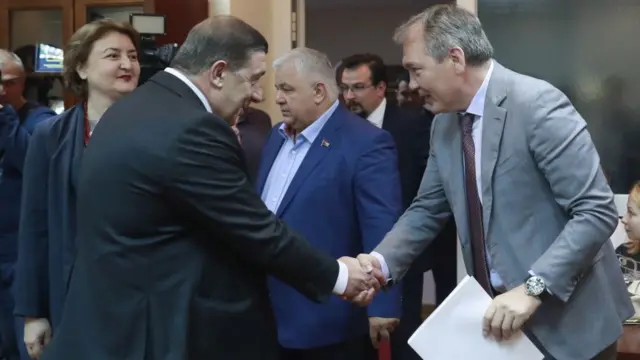 Член "Альянса патриотов" Гоча Тевдоразде и глава думского комитета по делам СНГ Леонид Калашников на встрече в Москве, июль 2019 года