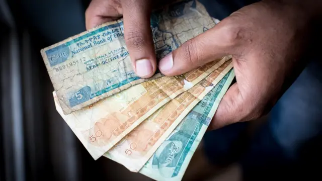 ethiopia devalues birr by 15%