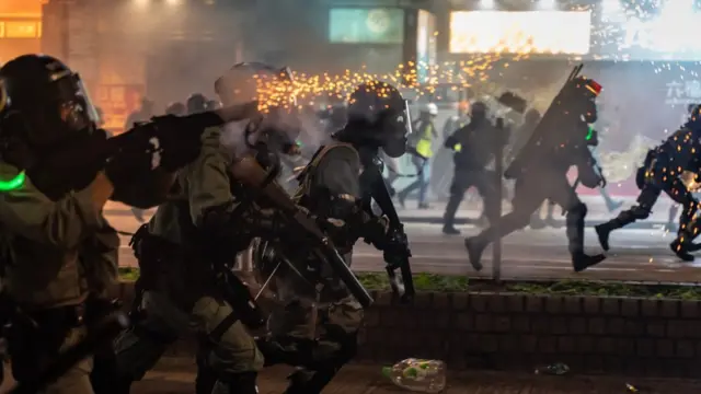 Riot police fire teargas as they charge on a street on November 2, 2019 in Hong Kong, China.