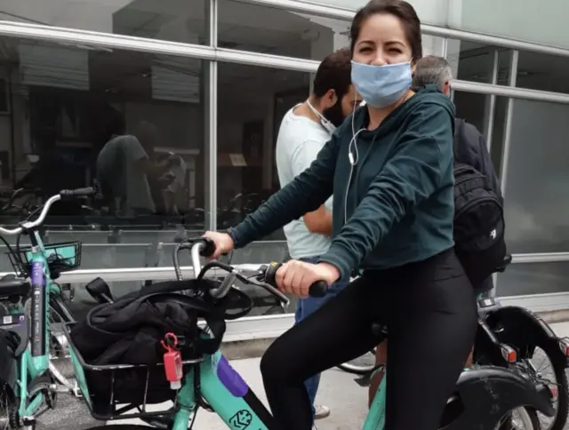 Martha Valdés with her bike in Bogota
