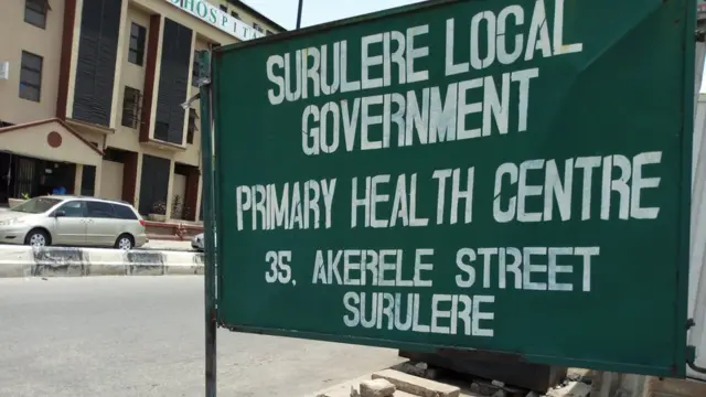Dis na di sign post of Primary Health Centre Surulere.
