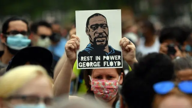 Protesters gather to demonstrate the death of George Floyd