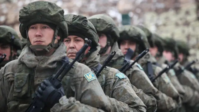 Servicemen stand in formation during the closing ceremony of the Unbreakable Brotherhood 2021 military drills held by the CSTO Peacekeeping Forces