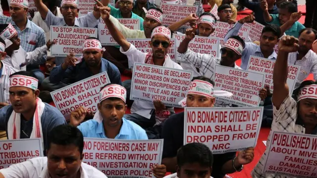 Members of an Assam-based political party protest against the exclusion of people from the National Register of Citizens in Delhi on 4 August 2018.