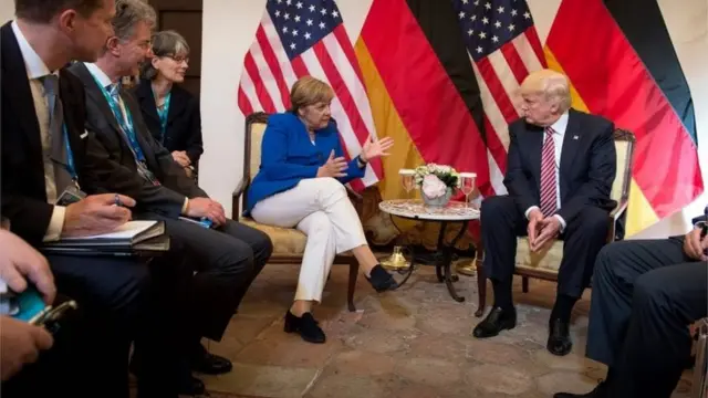 एंगेला मैरकल और डोनल्ड ट्रंप