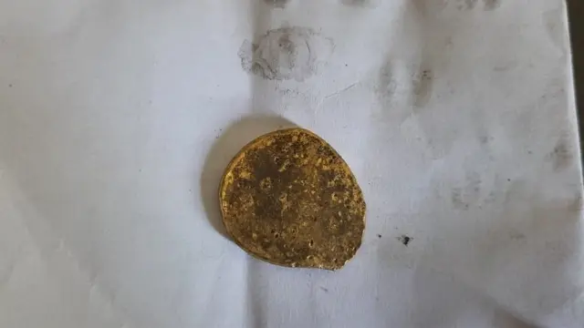 మట్టి నుంచి తీసిన బంగారం