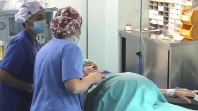 An old woman has given birth to a twin