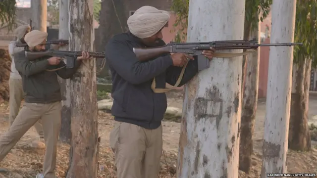 Indian police take up positions near the air force in Pathankot on January 4, 2016.