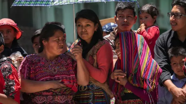 People gather in the town of Salcaja, in Guatemala, for an annual festival in August 2019