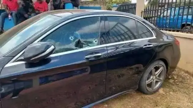 Benz car wey de young man dey drive