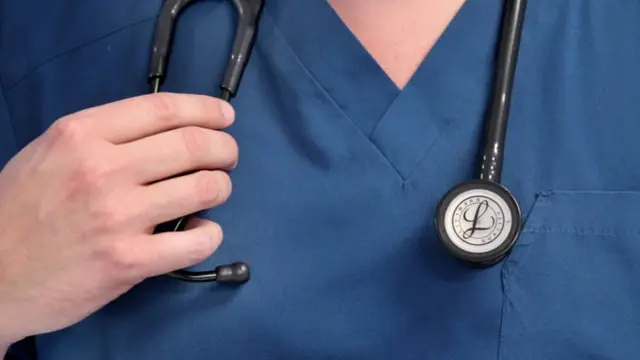 डॉक्टर की तस्वीर