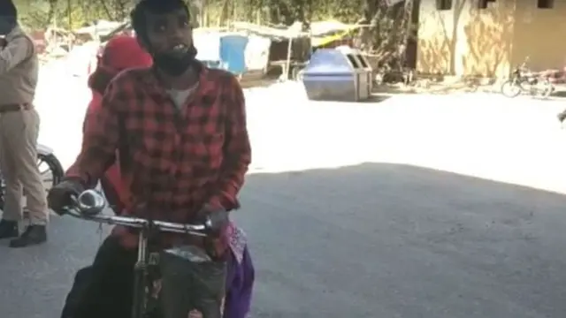 மனைவியை அழைத்துக் கொண்டு 750 கி.மீ சைக்கிளில் பயணித்த தொழிலாளி