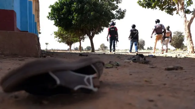 Police patrol inside the Government Science school in Kankara, in northwestern Katsina state, Nigeria after gunmen abducted students on December 15, 2020.