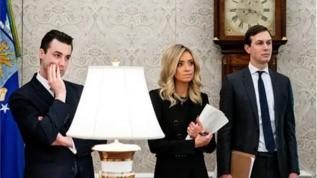 Nick Luna, on di left, work closely with Donald Trump