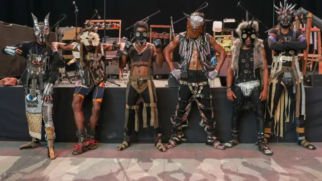The eco-afrofuturist punk band Fulu Miziki pose at the International Festival of Performing Arts.