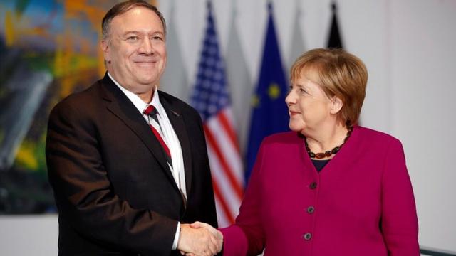 German Chancellor Angela Merkel shakes hands with US Secretary of State Mike Pompeo during a news conference in Berlin, Germany November 8, 2019