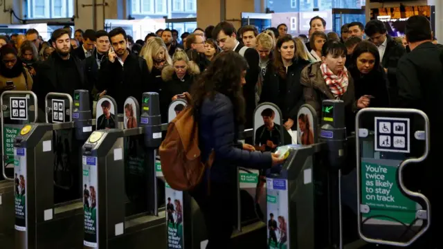 Queues at the ticket barriers at Clapham Junction