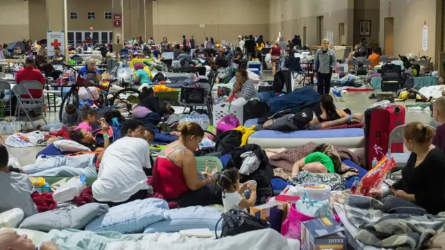 People living in a large hall