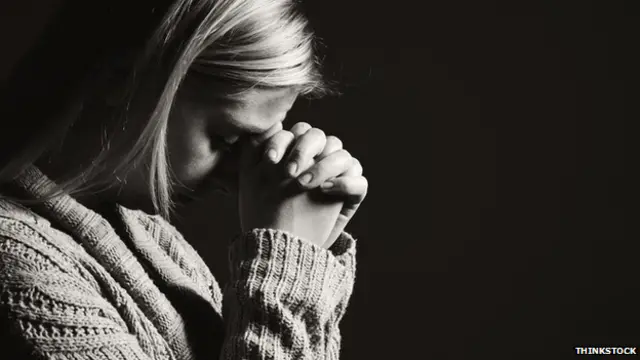 A woman looking sad