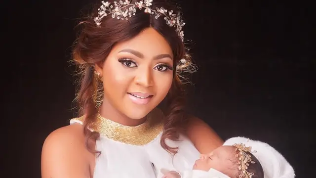 Regina Daniels and her pikin