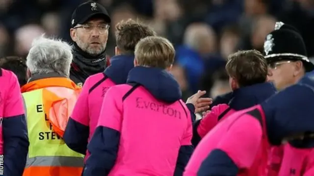 Liverpool manager Jurgen Klopp spoke to an Everton ball boy after his side's 1-1 draw at Everton