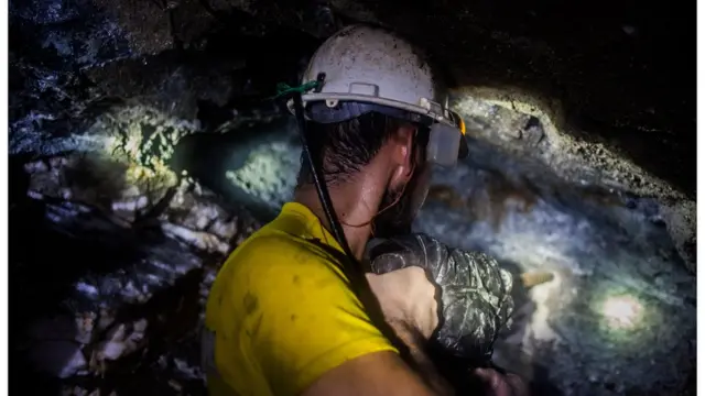 A worker in an underground gold mine.