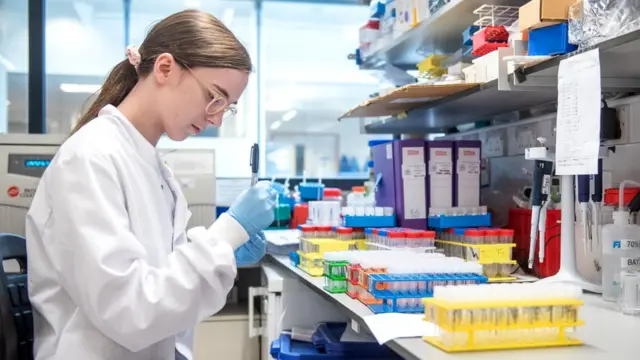 A University of Oxford researcher in a laboratory
