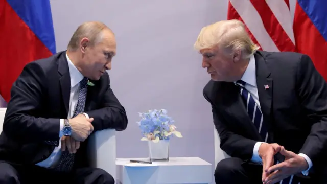 Russia"s President Vladimir Putin talks to U.S. President Donald Trump during their bilateral meeting at the G20 summit in Hamburg, Germany, July 7, 2017.