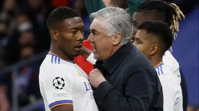 Real Madrid boss Carlo Ancelotti gives instructions to David Alaba