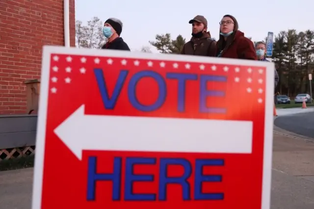 Voters wait in line at a polling location at the Old Stone School in Hillsboro, Virginia, USA, 03 November 2020.