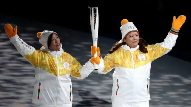 મશાલ સાથે ખેલાડી