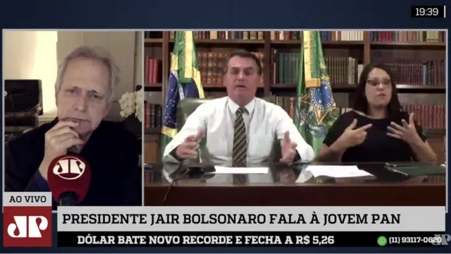 Telaesportivabet comTV mostra,esportivabet comum quadro, entrevistador; no outro, Bolsonaro falando ao ladoesportivabet comintérpreteesportivabet comLibras