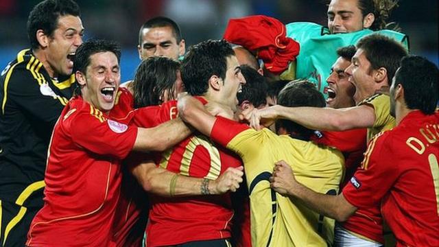 Fabregas and the Spain team celebrate their penalty shootout victory over Italy in 2008