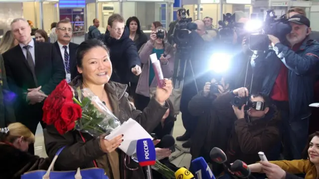 Ли Ен в аэропорту