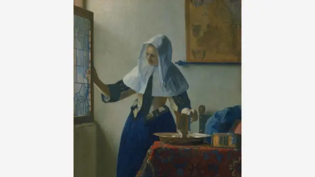 《持水壶的女人》