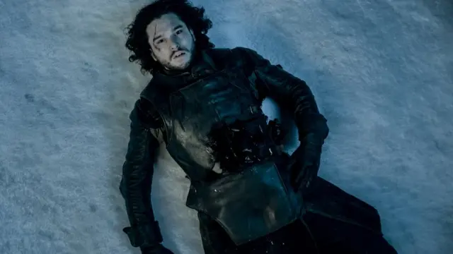 John Snow from Game of Thrones lying dead in the snow