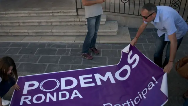 Una pancarta de Unidos Podemos