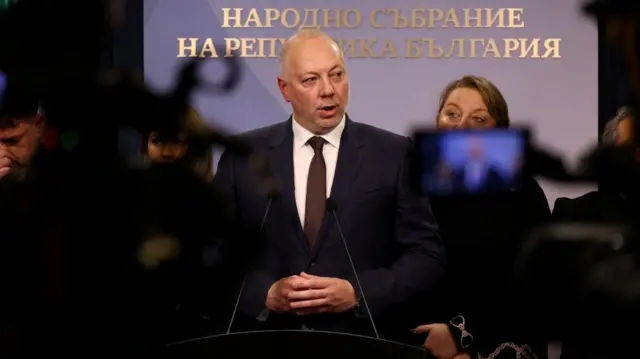 Bulgarian Prime Minister Rosen Zhelyazkov speaks to the media before announcing the resignation of his government