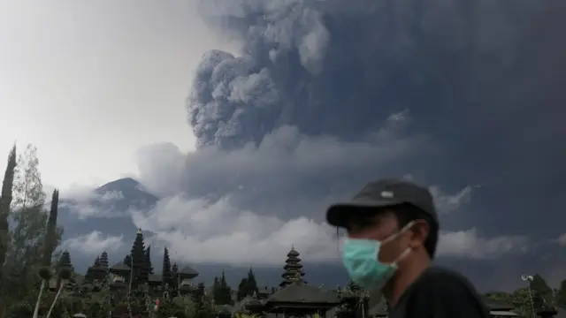 Mount Agung volcano erupts as seen from Besakih Temple in Karangasem, Bali