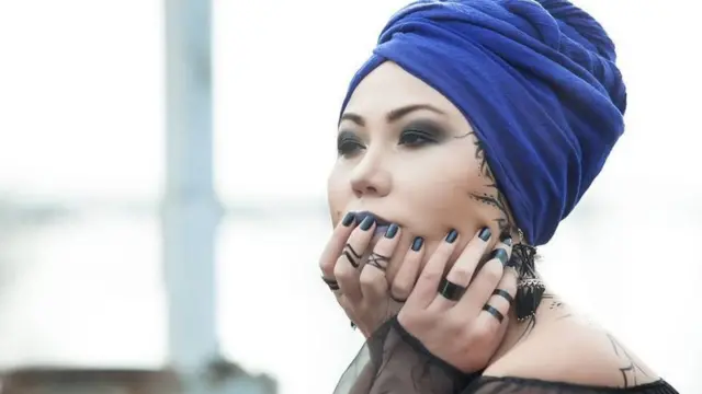 Алтын Капалова