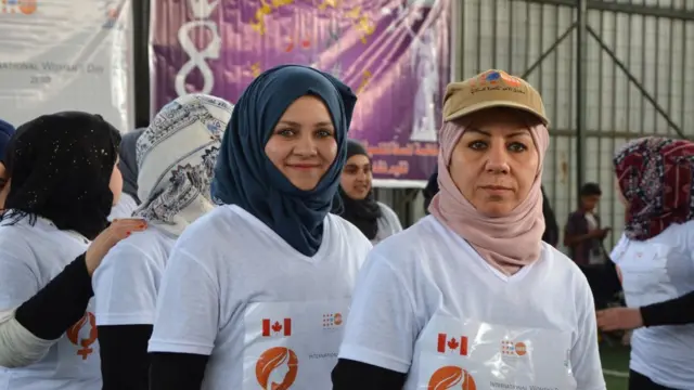 Iraqi women take part in a symbolic 900-metres marathon to mark Women's Day in the former embattled city of Mosul on March 8, 2018 eight months after Iraqi forces retook the northern Iraqi city from Islamic State (IS) jihadists