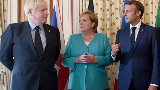 از راست رئیس فرانسه، صدراعظم آلمان و نخست وزیر بریتانیا. سه کشور عضو اروپایی توافق برجام با ایران هستند