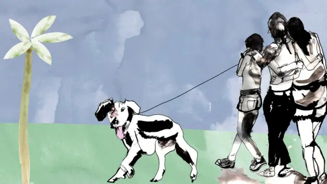 कुत्ते के साथ मां और बेटियां